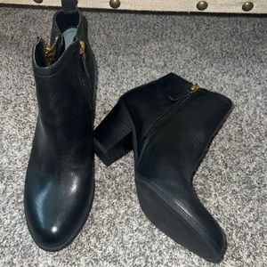 Black ankle boots. Never worn.